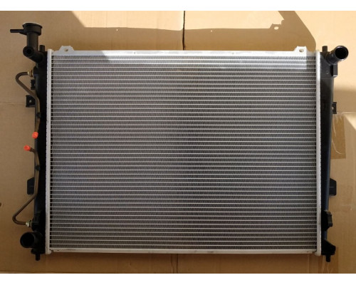 KEMP Радіатор KIA Carens FG (06-) 640 x 490 x 18 мм плоскі соти