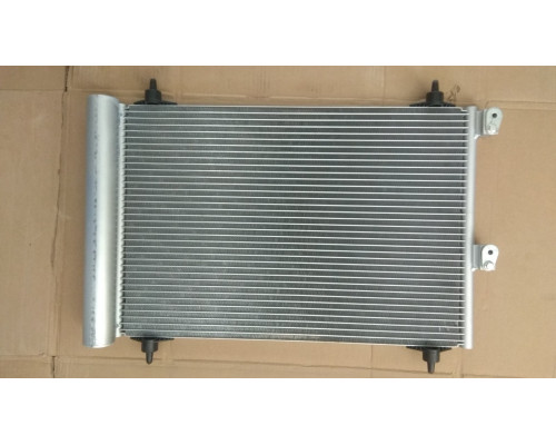 KEMP Радіатор кондиціонера Peugeot Partner 06- 520*360 (з осушувачем)