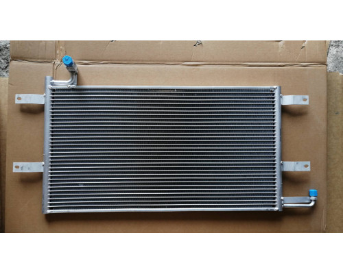 KEMP Радіатор кондиціонера VW Passat 88-96 р. 710*330 (без осушувача)